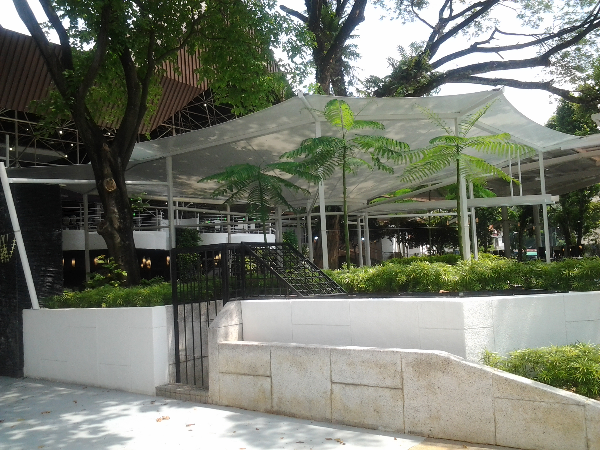 Translucent tensile fabric structure at Laman Menara Maybank food court, Kuala Lumpur